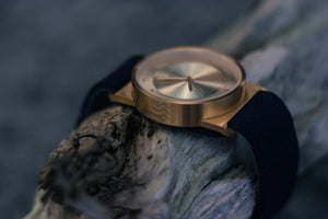 Gold watch with upcycled wetsuit strap