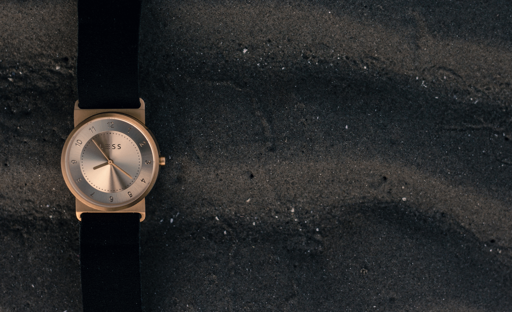 gold watch minimalist design upcycled wetsuit strap on beach